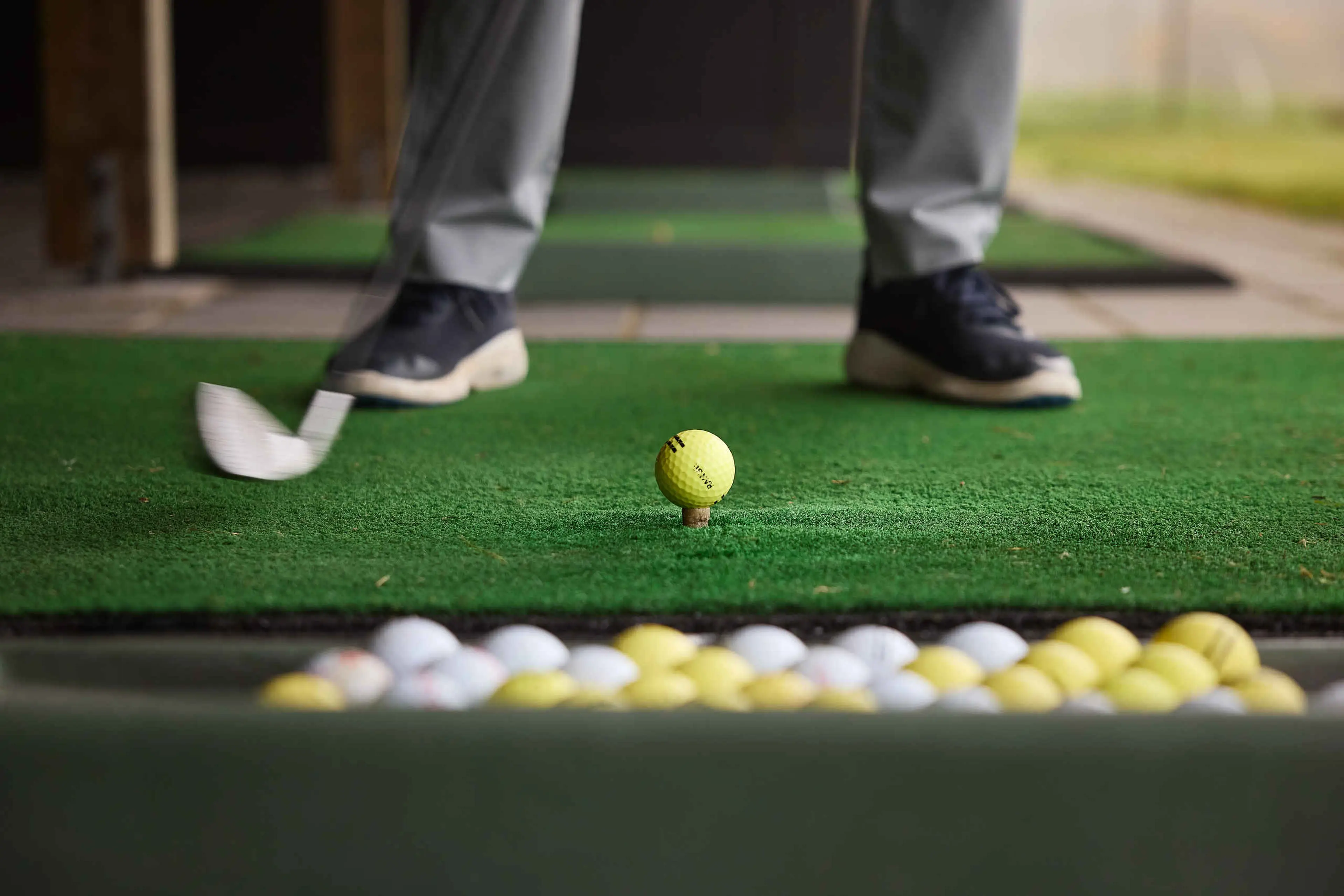 Close up van golfer in de driving range van Golf De Gulbergen