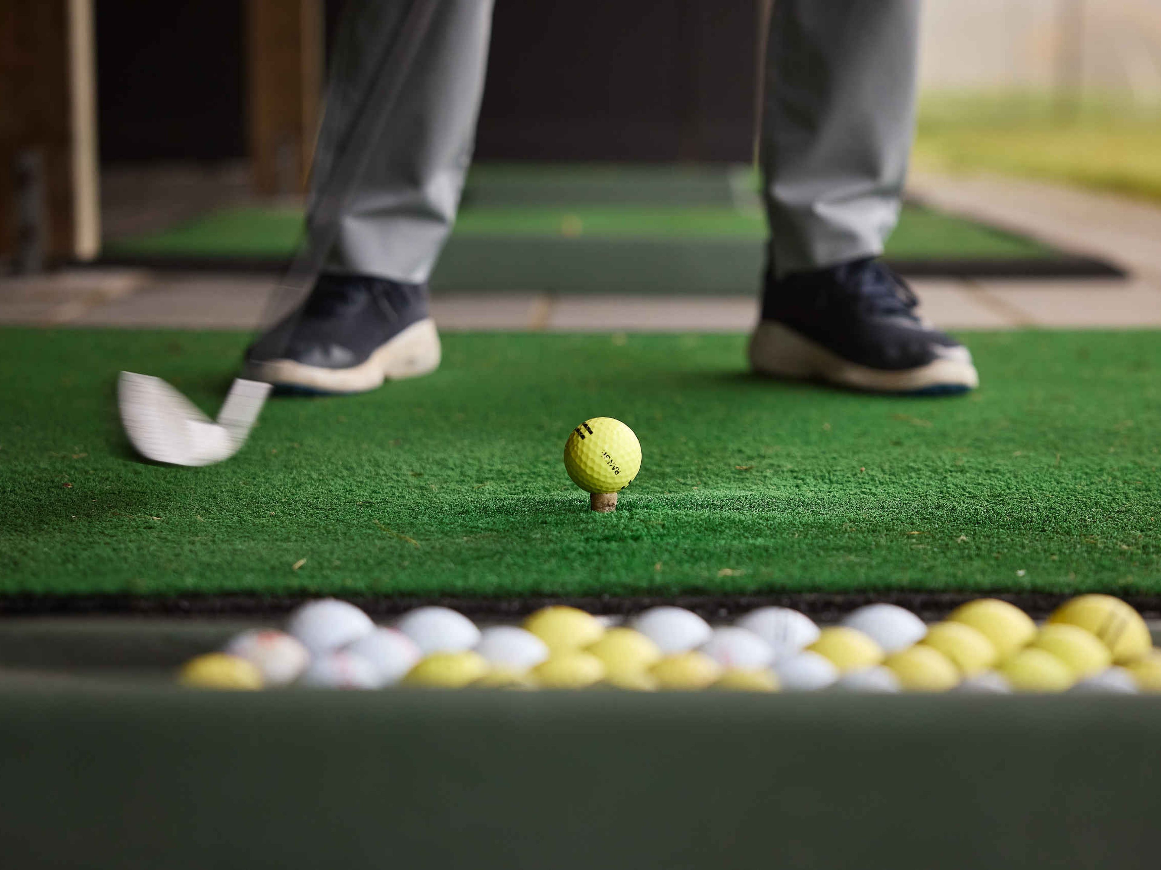 Close up van golfer in de driving range van Golf De Gulbergen