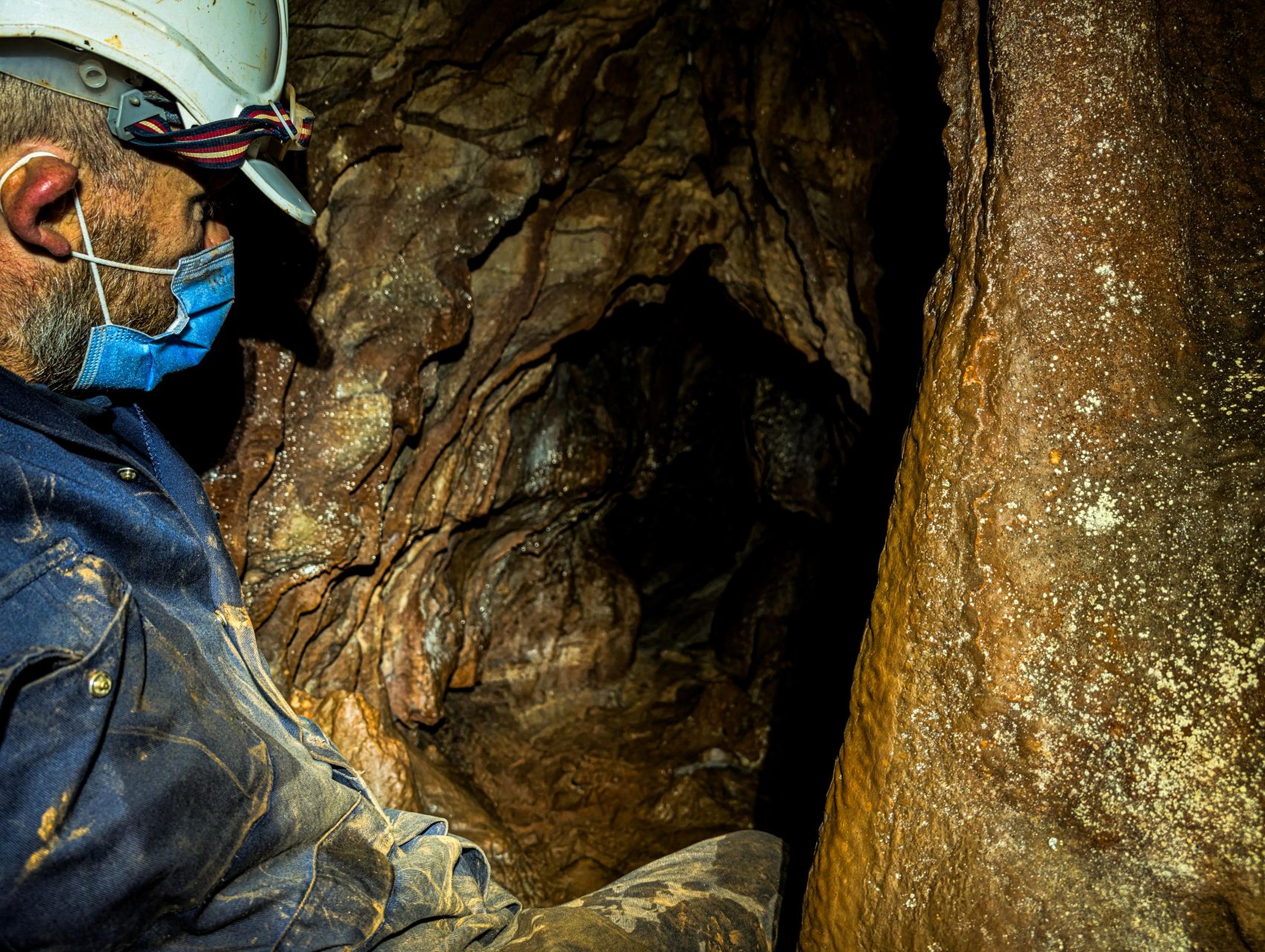 Reserves warden for Paignton Zoo entering Clennon Gorge karst caves for ecological survey