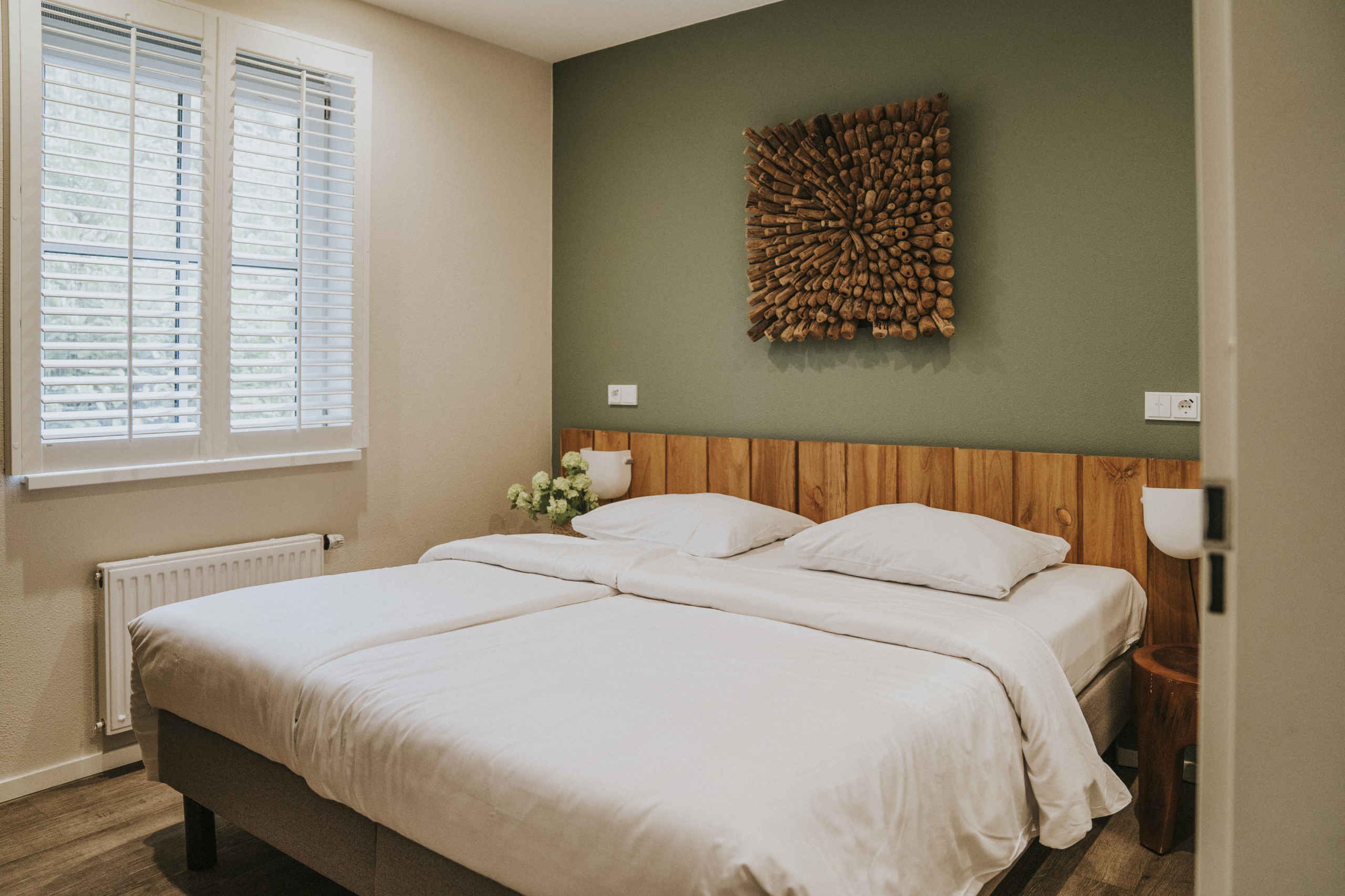 Slaapkamer in Villa Alpaca op Vakantiepark Dierenbos