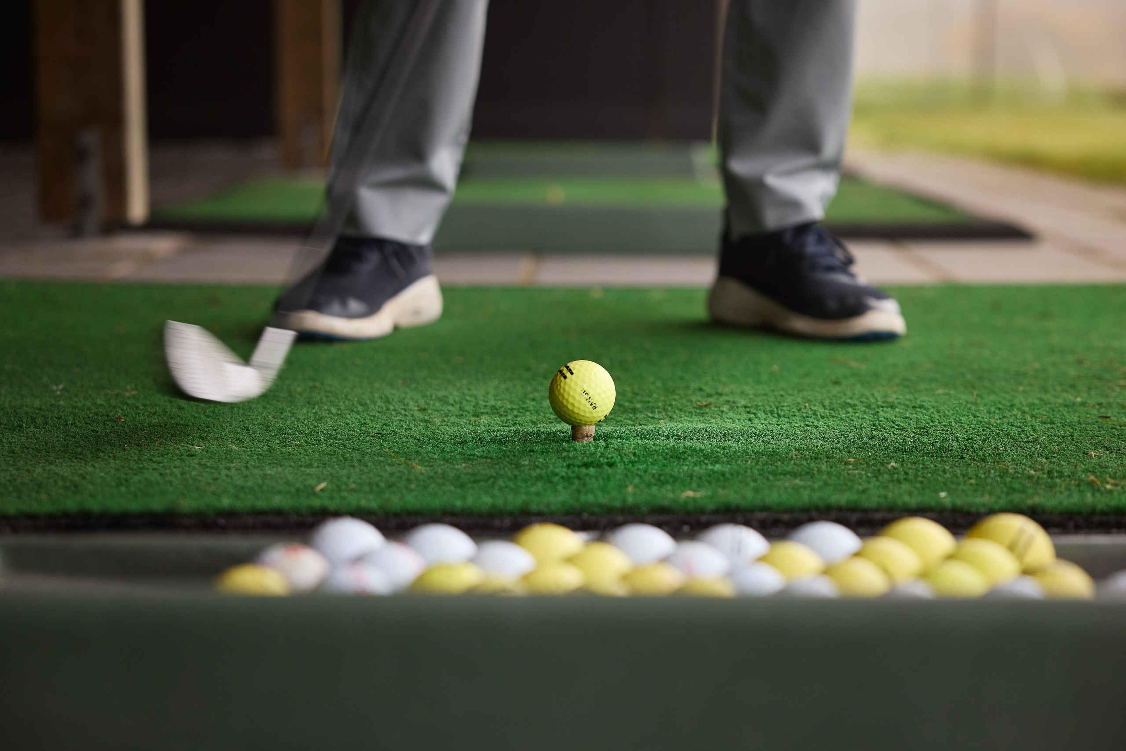 Close up van golfer in de driving range van Golf De Gulbergen