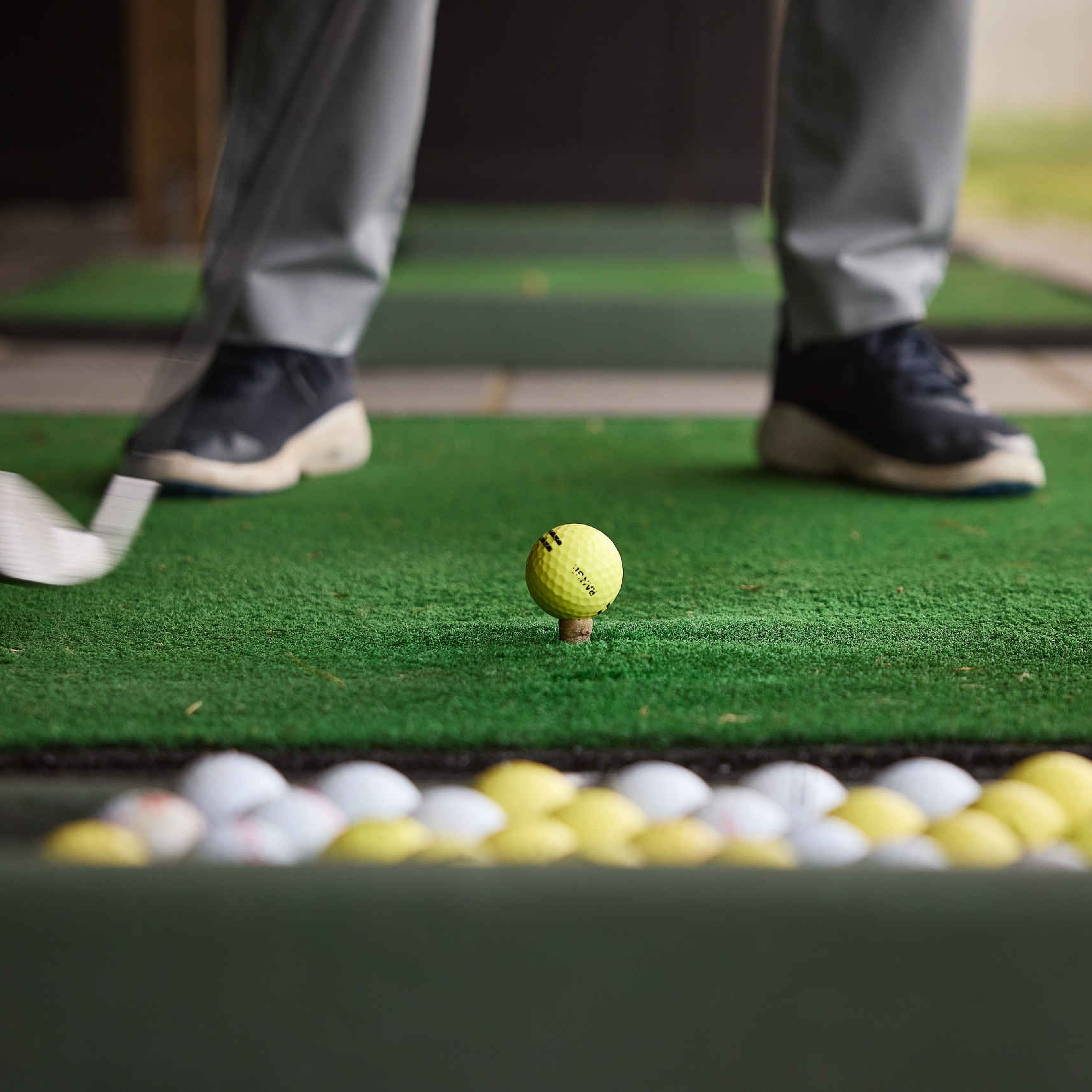 Close up van golfer in de driving range van Golf De Gulbergen