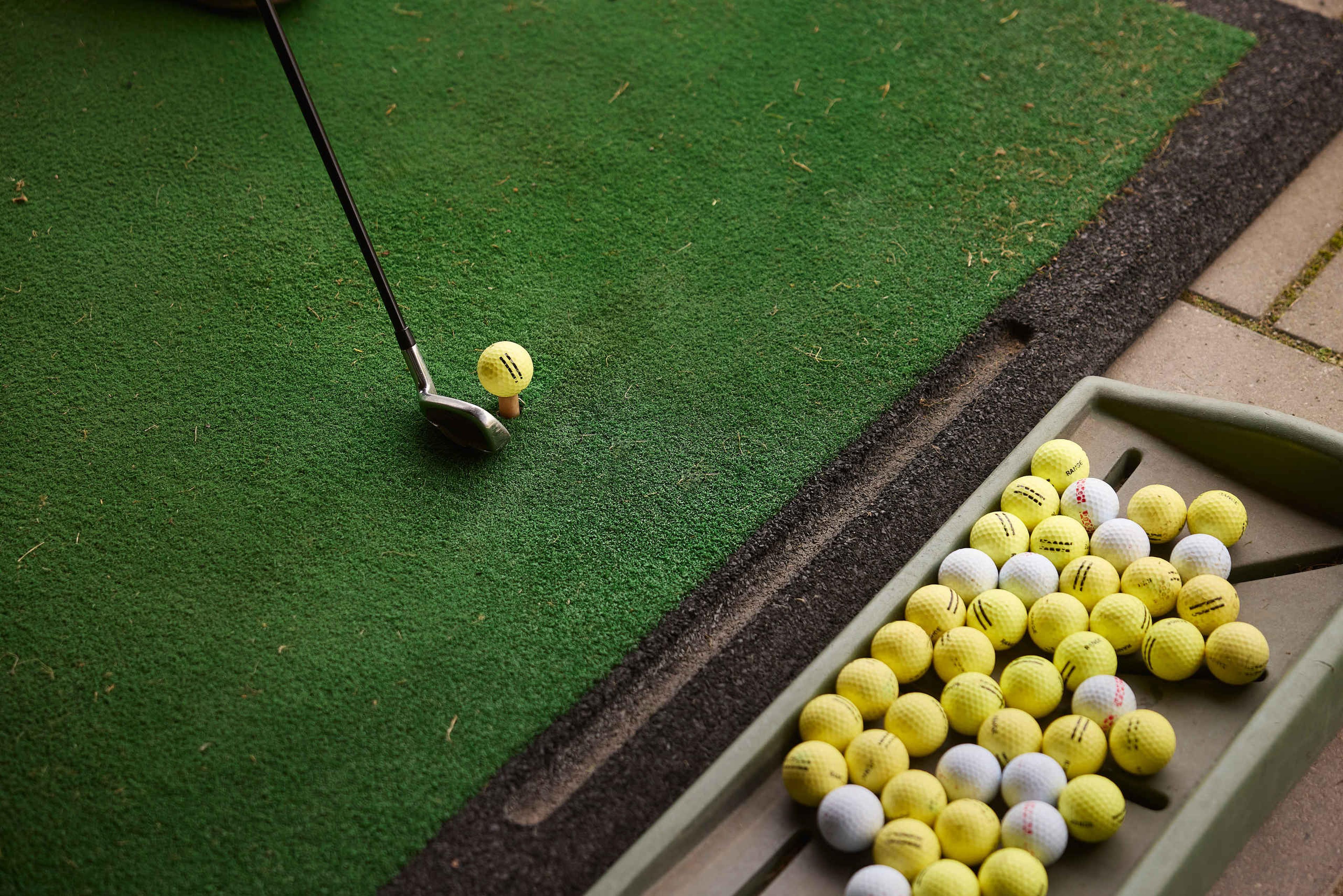 Close-up driving range golfen Golf De Gulbergen
