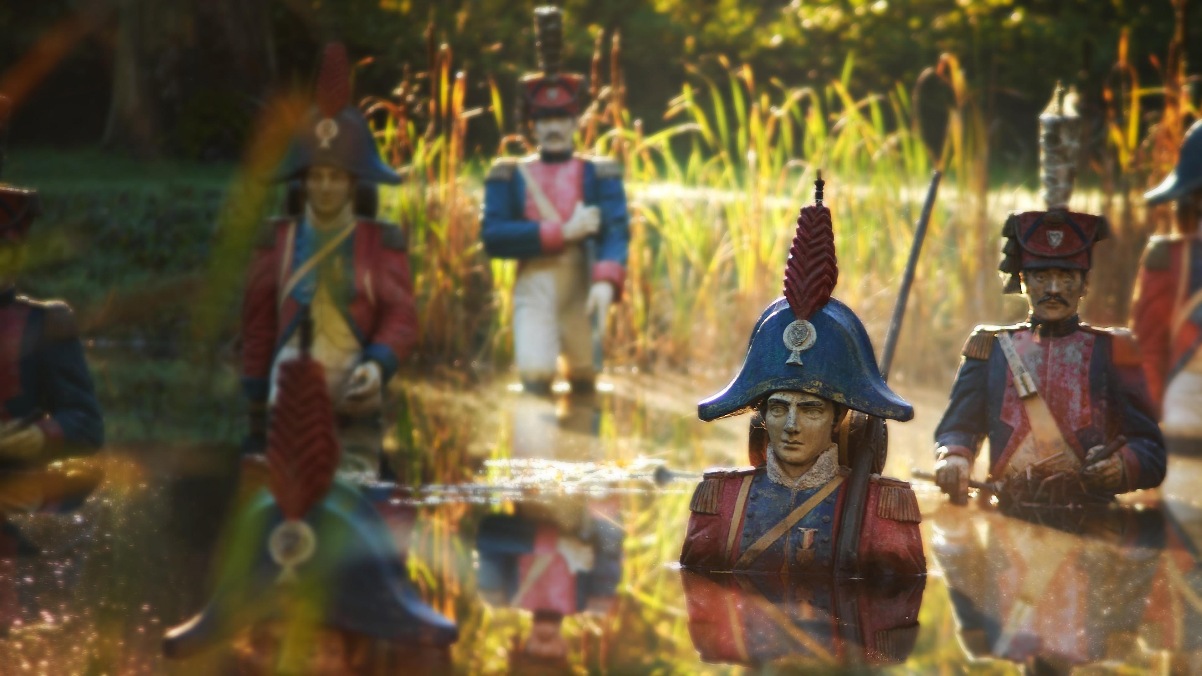 Soldaten in de vijver van Kasteel Steenenburg