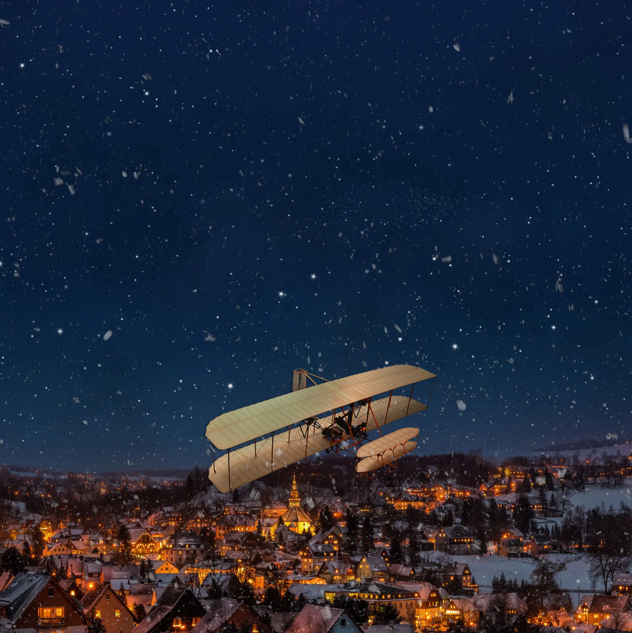 Een Wright Flyer vlak boven een kerstdorpje