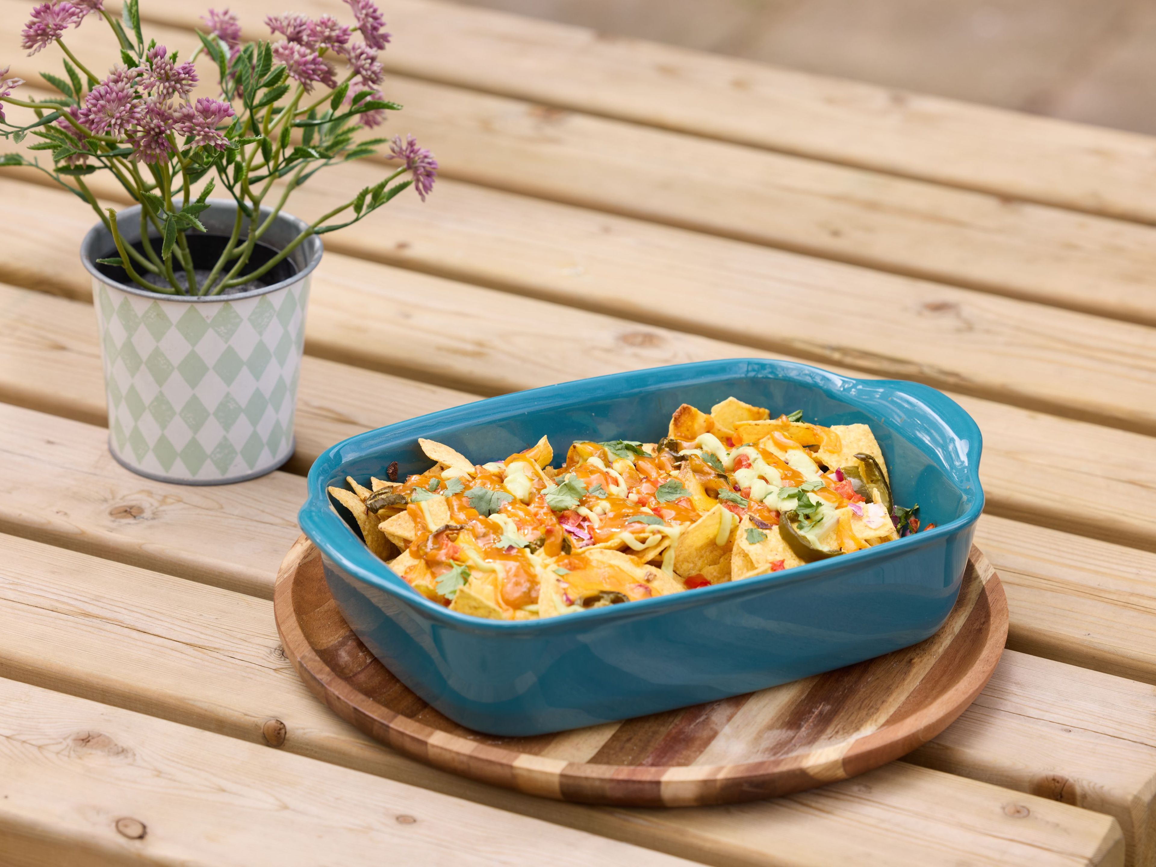 Nacho's op het terras van restaurant Klimrijk Brabant